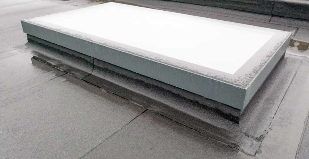 installation de lanterneau sur toit plat avec étanchéité